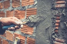 gallery/bricklaying-construction-worker-building-brick-wall_1150-14756